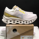 Tênis On Running Cloudmonster 3 bege/amarelo