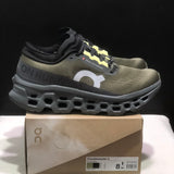 Tênis On Running Cloudmonster 3 marrom/amarelo