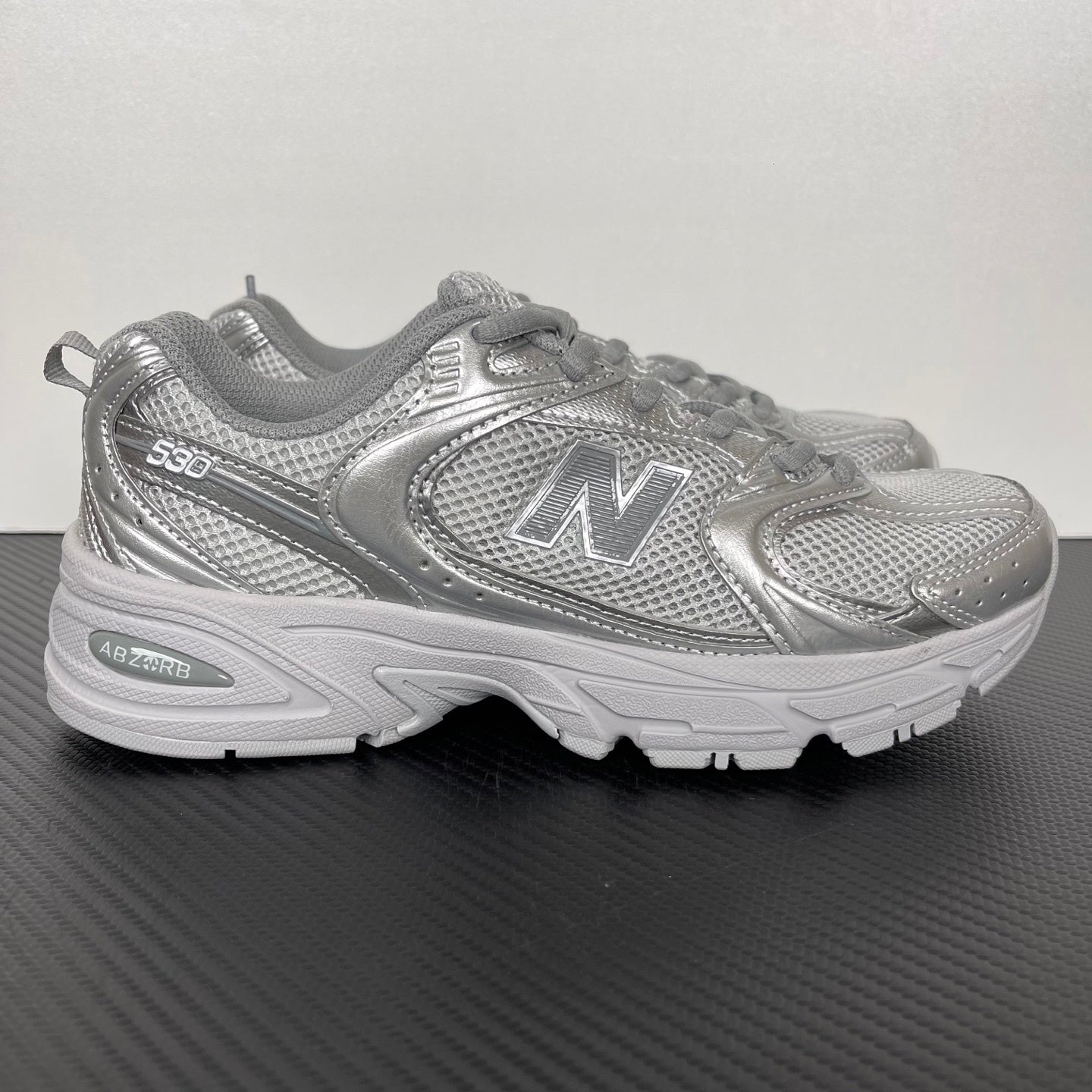 NB 530 Prata/Cinza