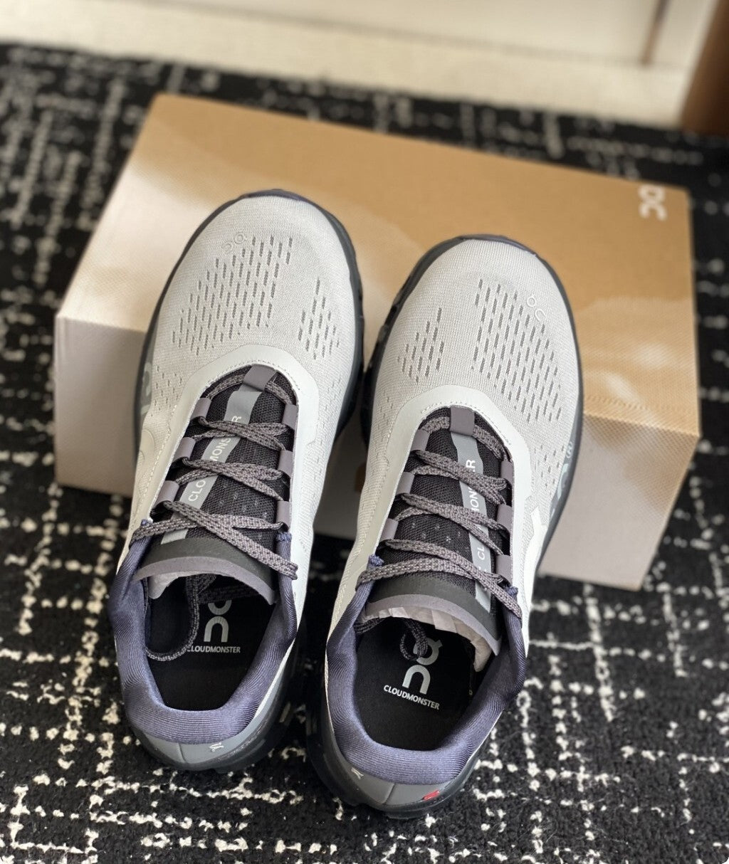 Tênis On Running Cloudmonster Cinza/Branco