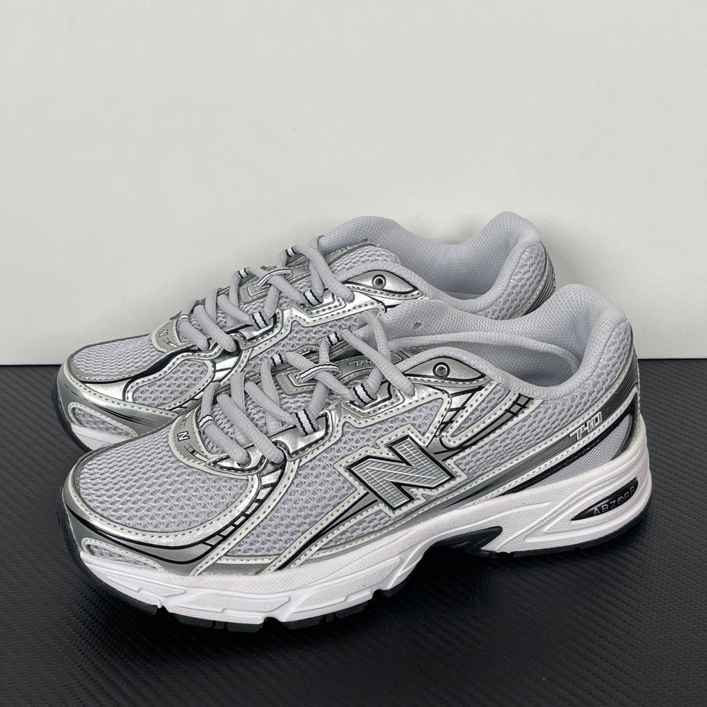Tênis New Balance NB 740 cinza/prata