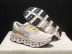Tênis On Running Cloudmonster 3 bege/amarelo
