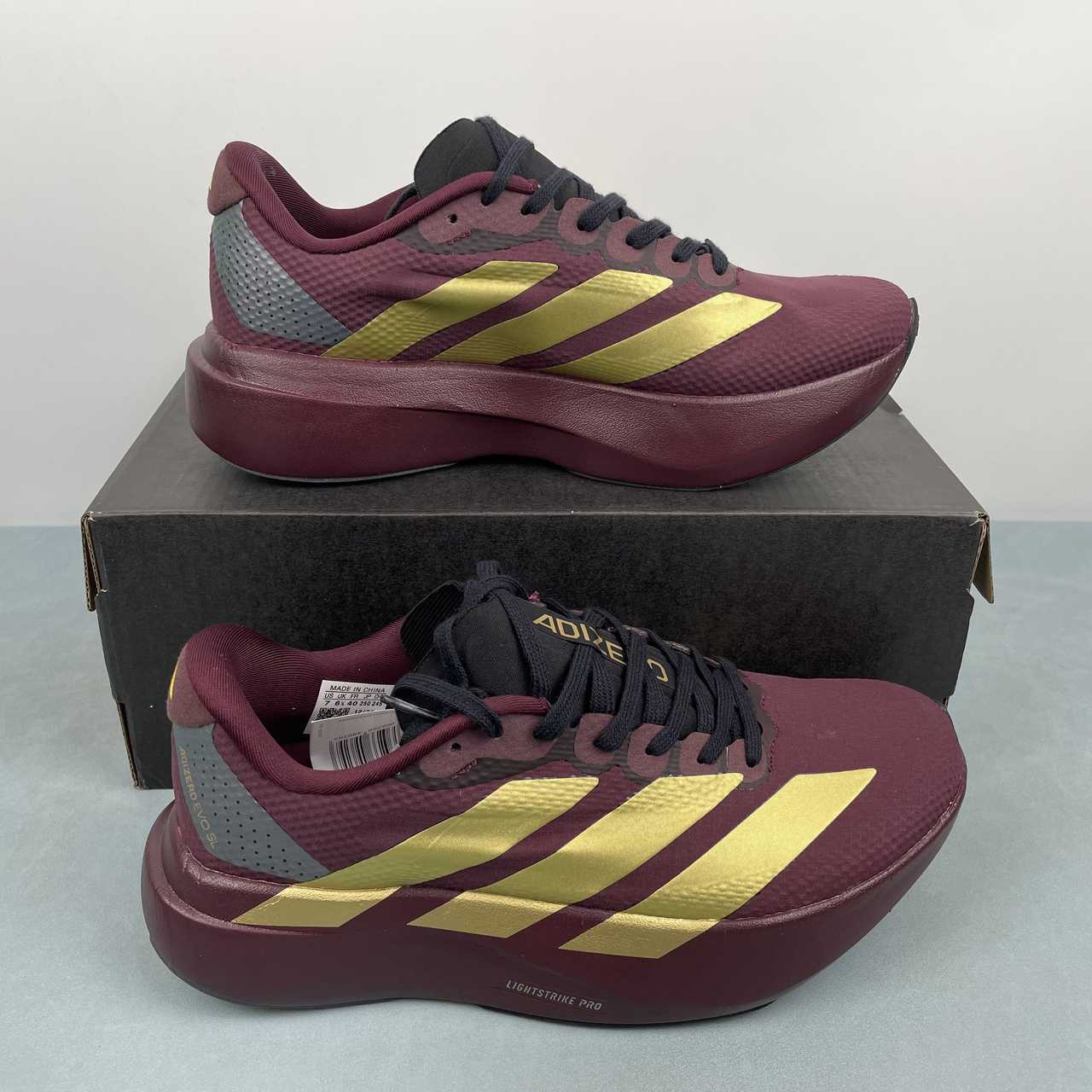 Adizero Evo SL Vinho/dourado