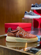 Tênis Ferragamo Gancini em couro Marrom
