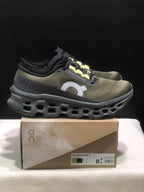 Tênis On Running Cloudmonster 3 marrom/amarelo