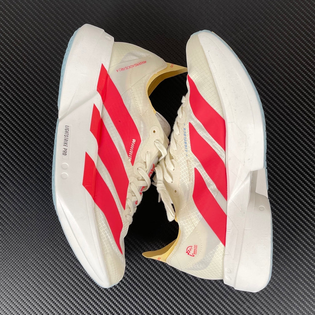 Adizero Adios Pro 4 dourado/vermelho