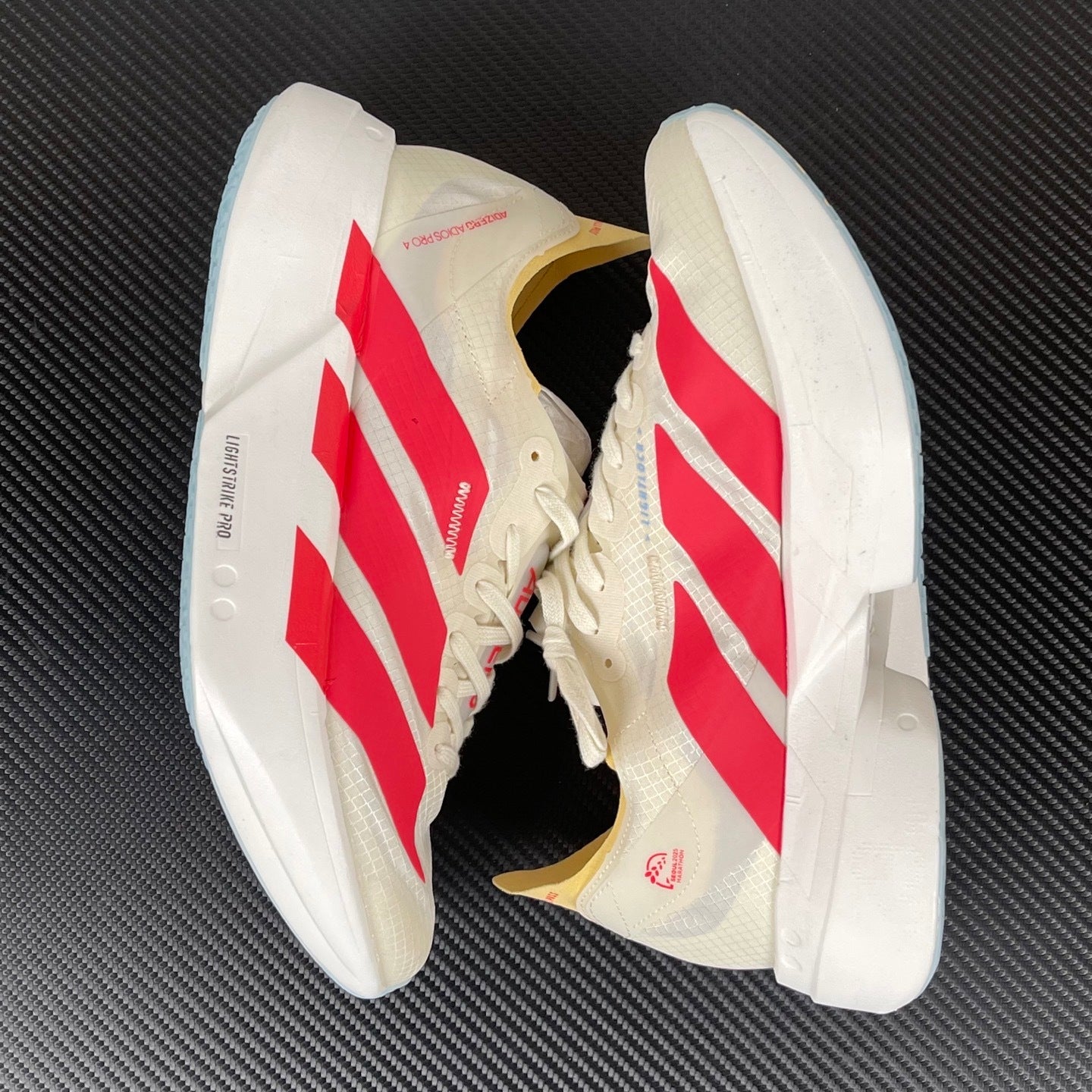 Adizero Adios Pro 4 dourado/vermelho