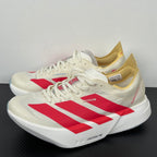 Adizero Adios Pro 4 dourado/vermelho