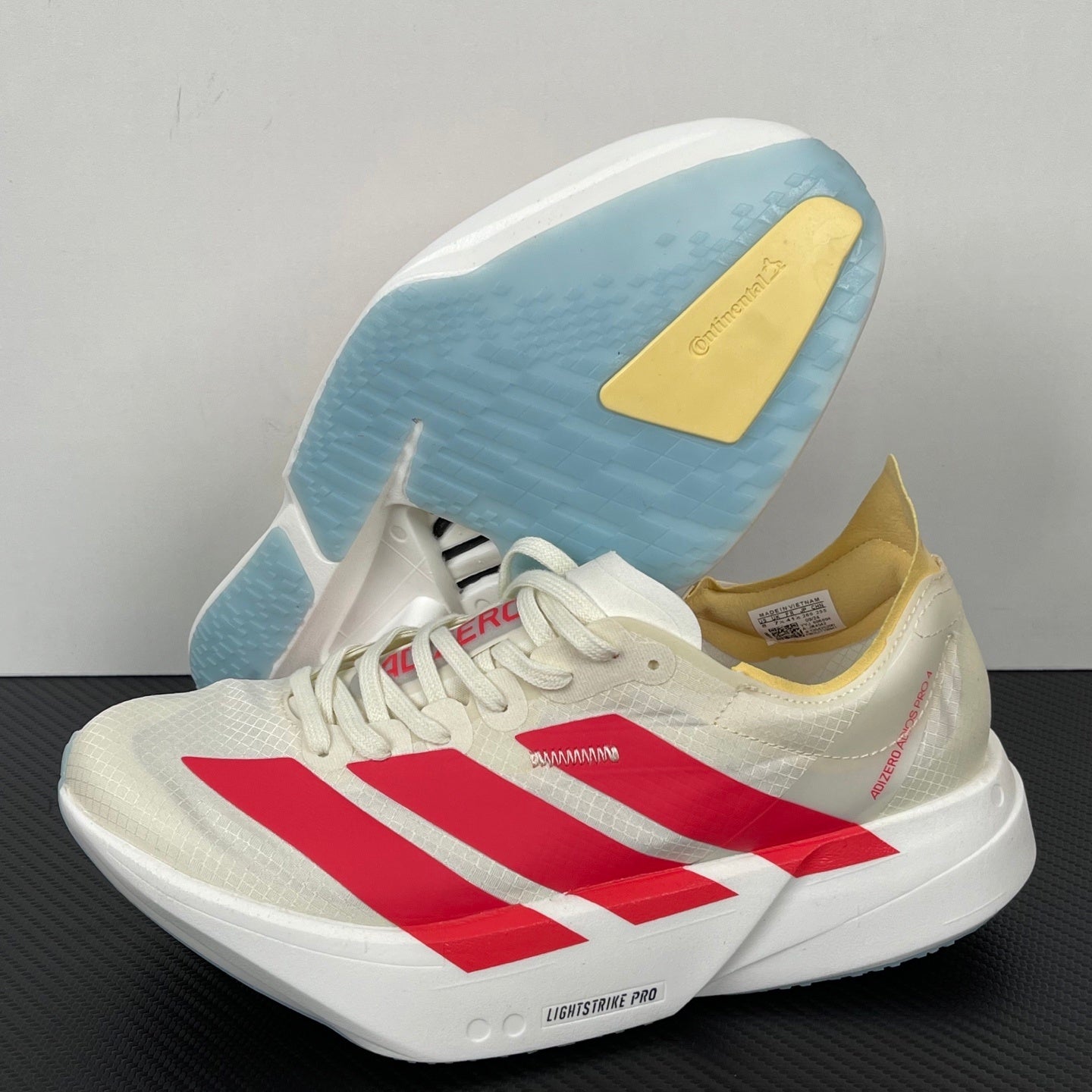 Adizero Adios Pro 4 dourado/vermelho