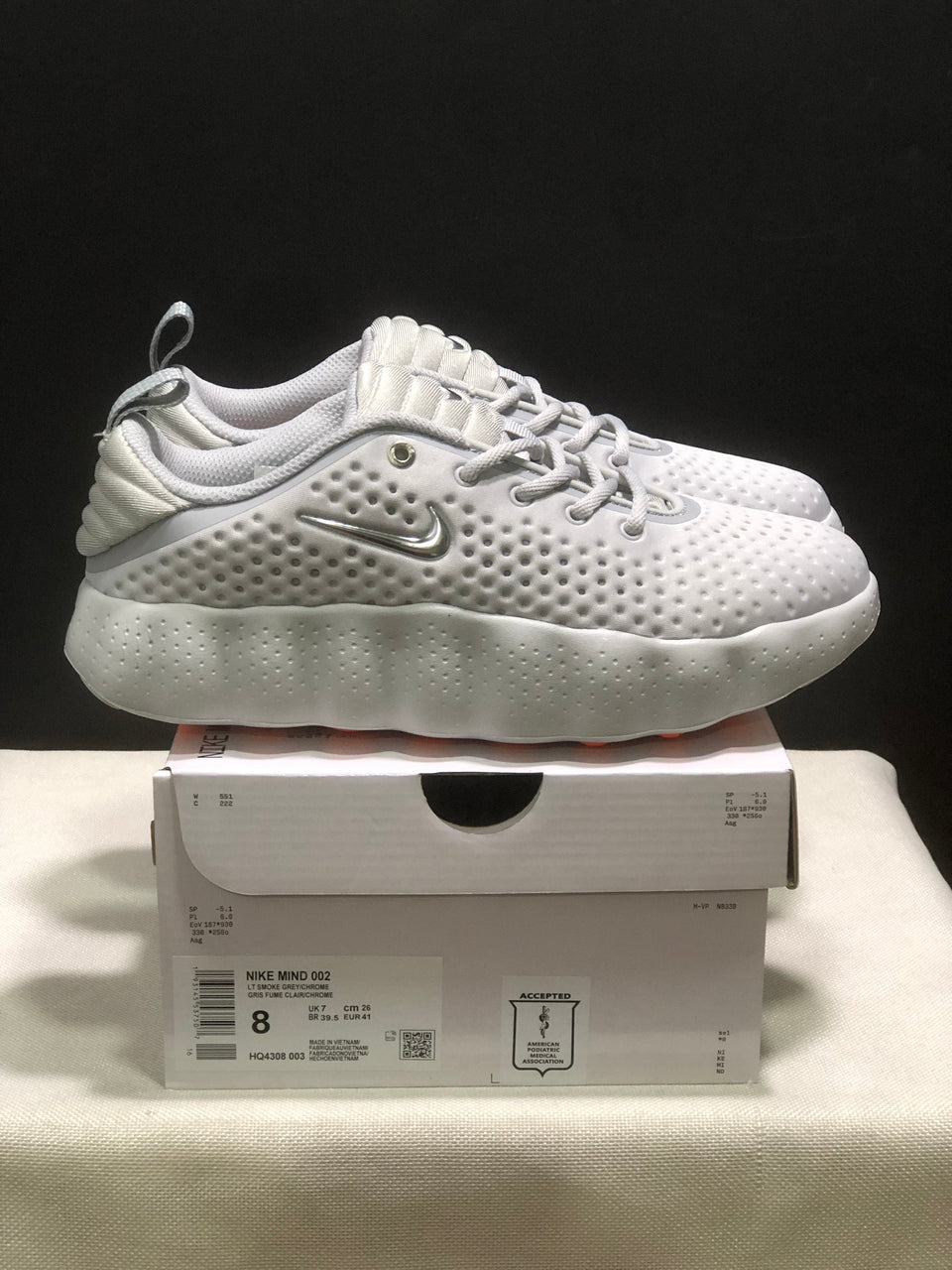 Tênis Nike Mind 002 Cinza