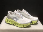 Tênis On Running Cloudmonster 3 branco/amarelo