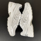 Tênis New Balance NB 740 branco/prata
