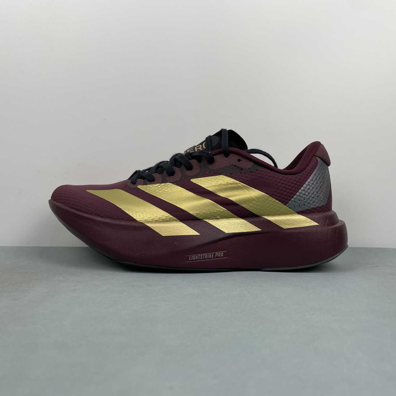 Adizero Evo SL Vinho/dourado