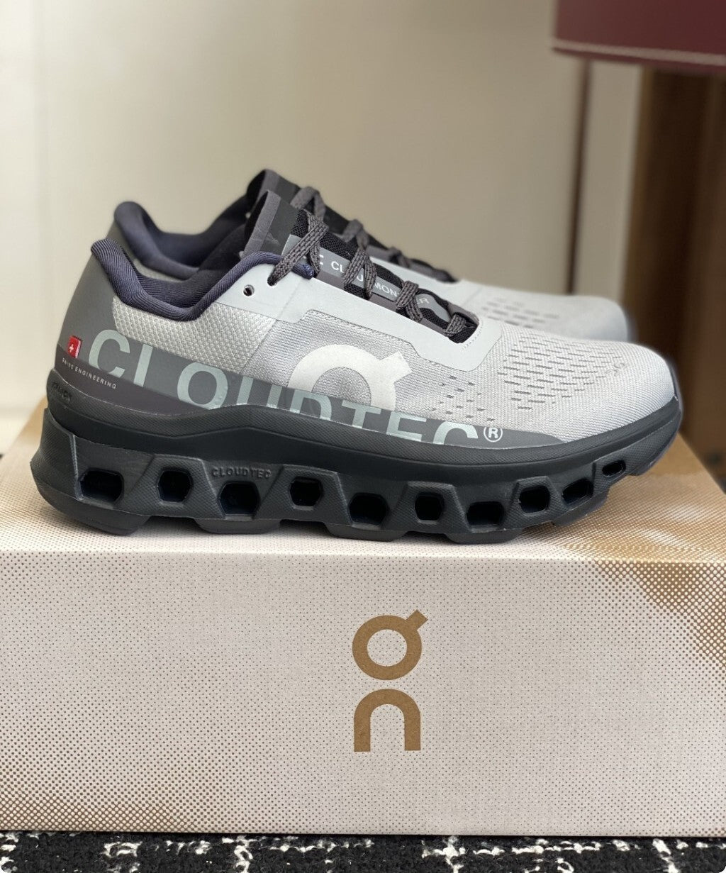 Tênis On Running Cloudmonster Cinza/Branco