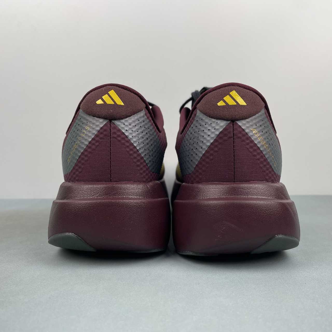Adizero Evo SL Vinho/dourado