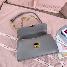 Bolsa MiuMiu Baguette em couro Napa  24X13.5X9cm (Cinza e outras cores)