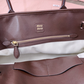 Bolsa MiuMiu Aventure em couro Napa  44X22.5X14.5CM (Marrom, Preta, Caramelo)