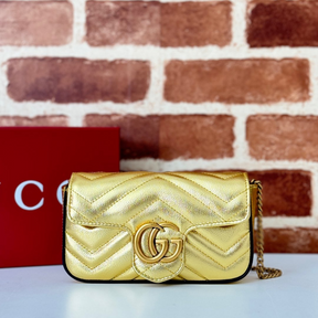 Bolsa Gucci GG Marmont Couro Dourado Super Mini/Média/Grande