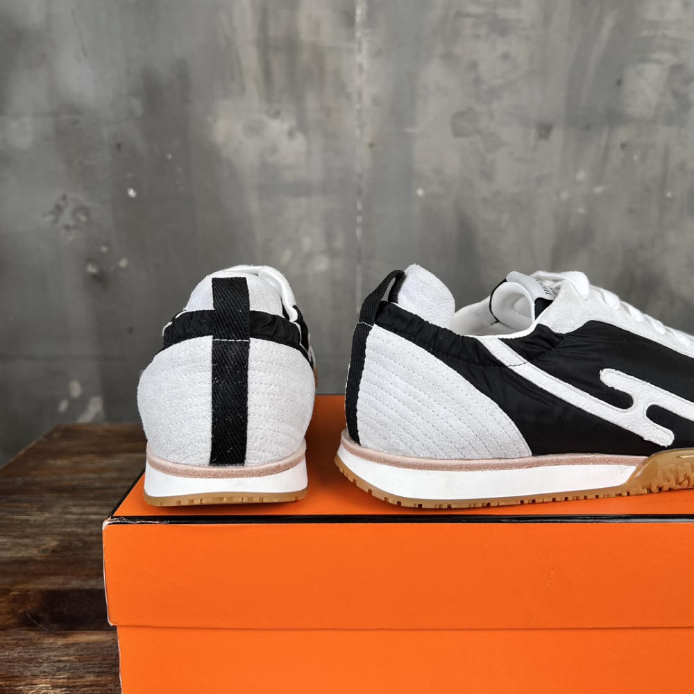 Tênis Hermès Jet em Lona técnica e camurça Preto/Branco