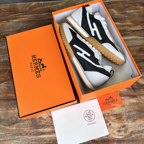 Tênis Hermès Jet em Lona técnica e camurça Preto/Branco