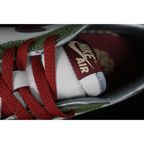 AIR JORDAN 1 LOW YEAR OF THE DRAGON CEDAR/OIL GREEN/LIGHT PUMICE/DARK TEAM RED