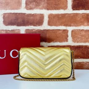 Bolsa Gucci GG Marmont Couro Dourado Super Mini/Média/Grande